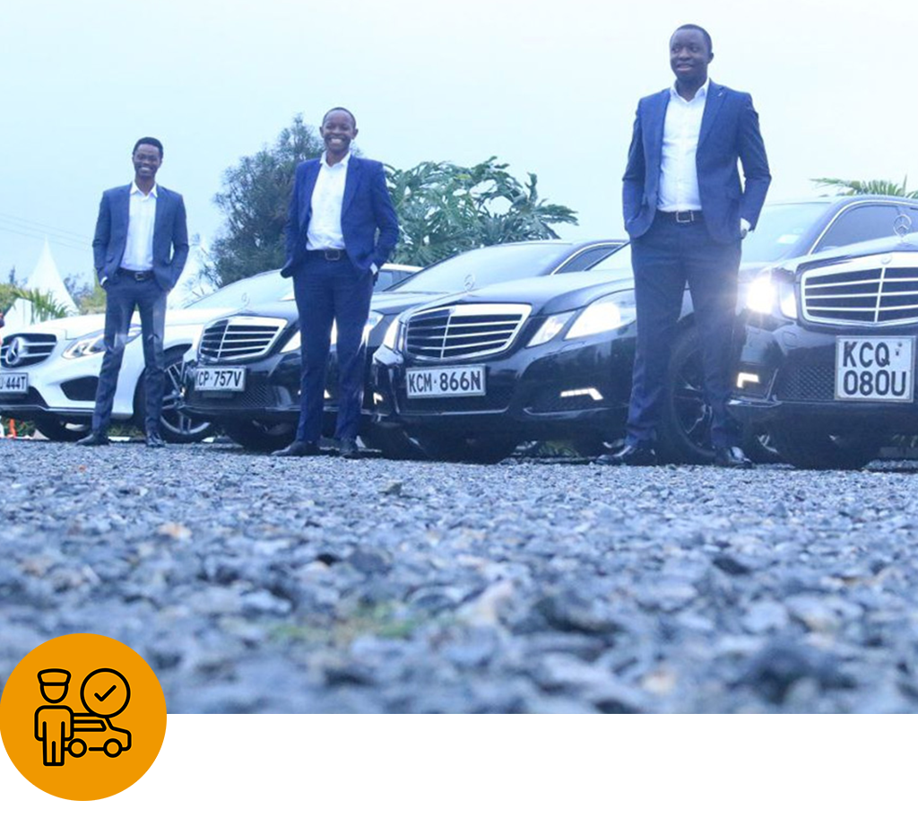 Comfleete Executive Concierge featuring professional chauffeurs standing beside a fleet of luxury vehicles, representing personalised support and tailored executive travel services.